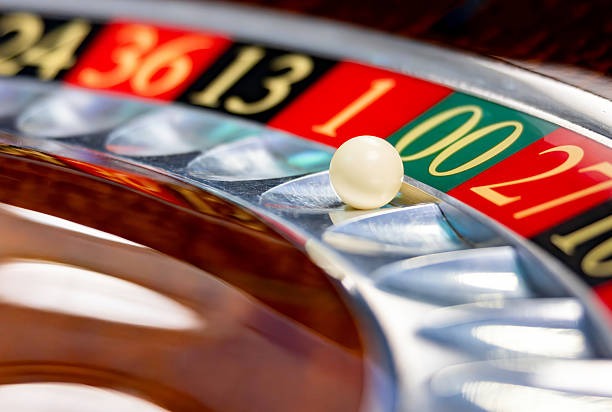 Mobile phone displaying live blackjack table with low-data streaming interface